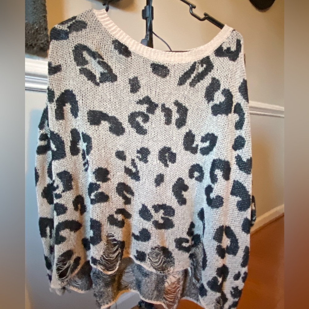 Amaryllis Cheetah Distressed long Sleeve sweater